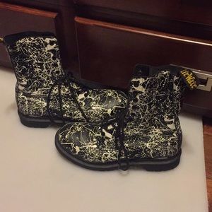 Paint splattered Dr. Marten’s Women’s size 10.